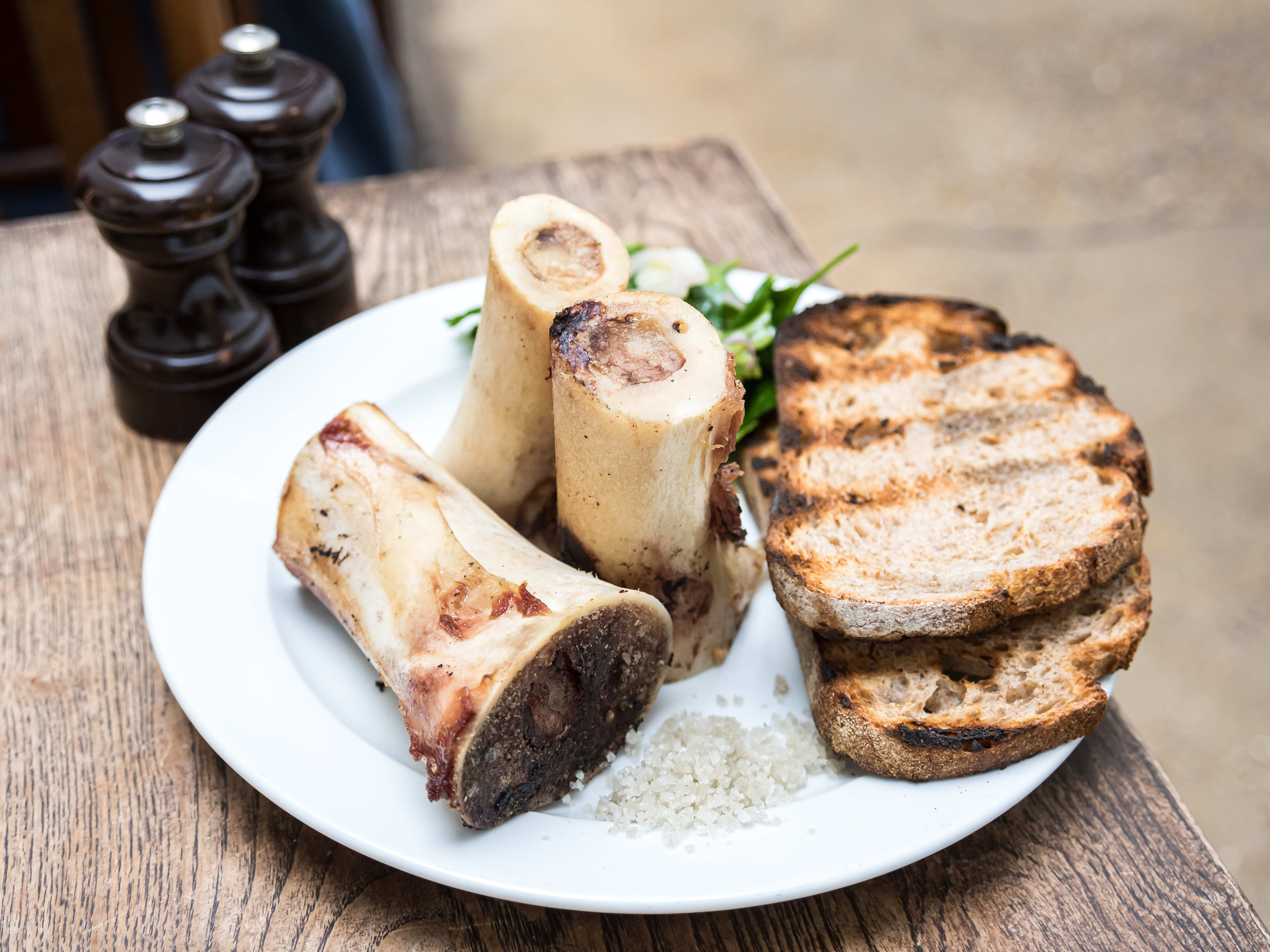 St. JOHN's iconic bone marrow dish in its simple, whitewashed dining room