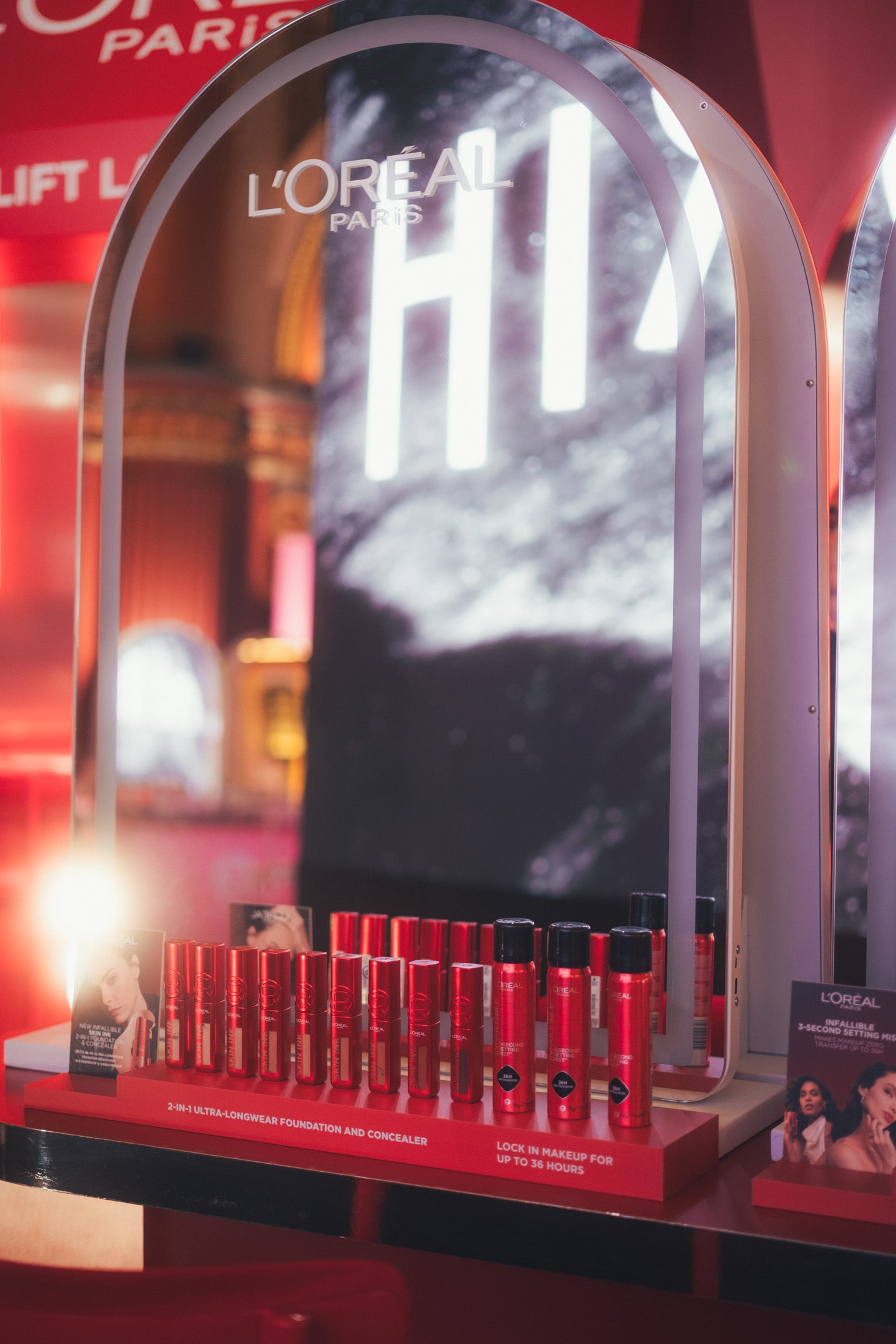loreal product on custom built make up beauty counter with arched mirror