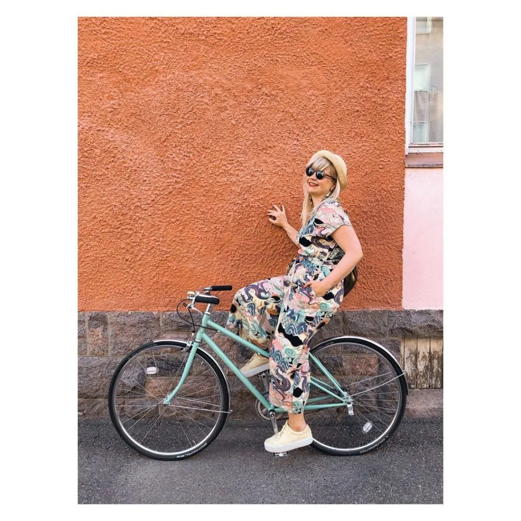 Pelago mint green bike with a classic frame and an orange front wall