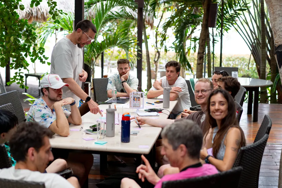Gridcoggers listening in an outdoor workshop session at the retreat
