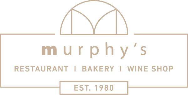 Murphy's logo with text 'Restaurant • Bakery • Wine Shop' and 'EST. 2000' in beige.