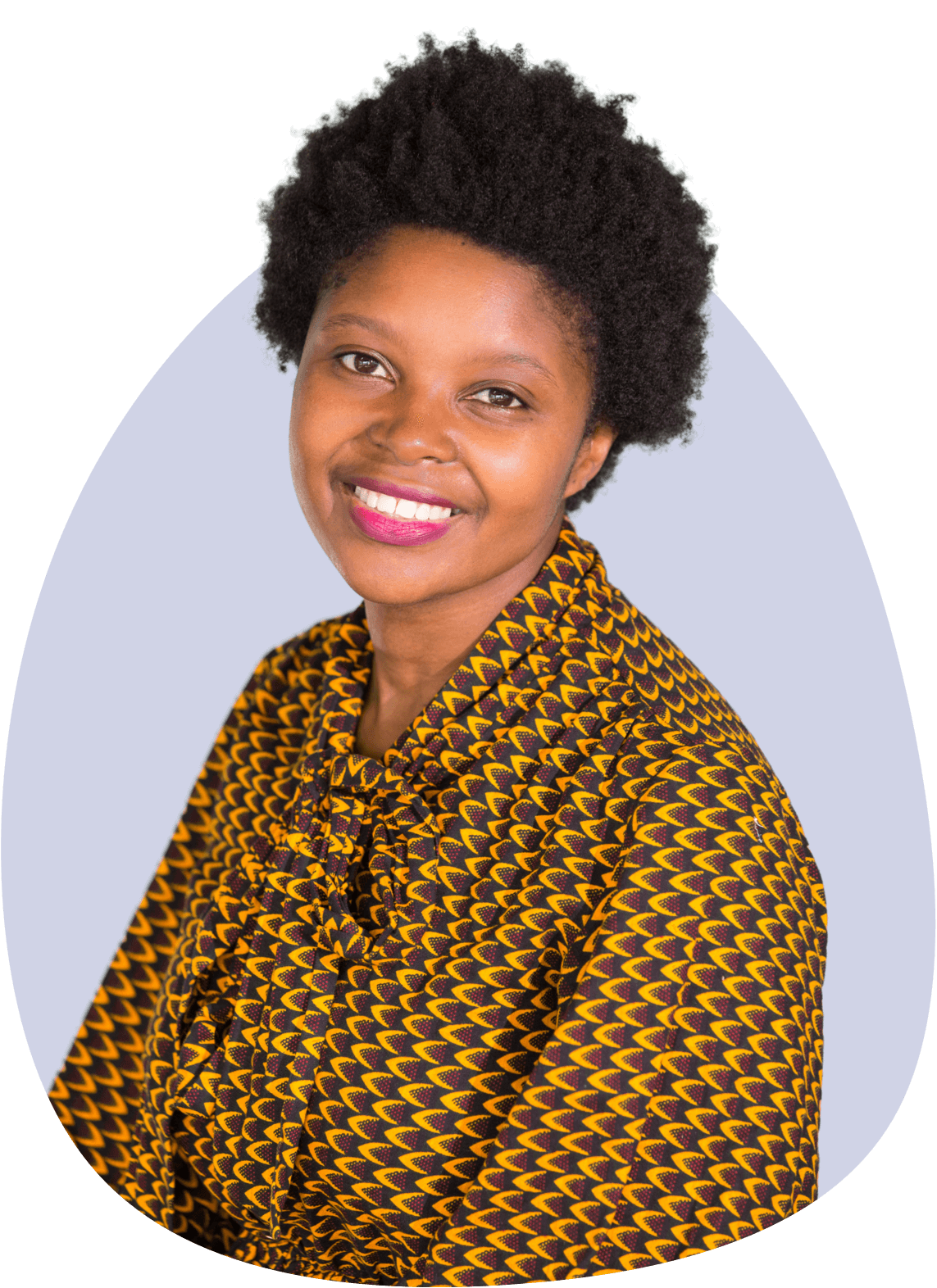 Woman in a yellow and black spotted shirt smiling