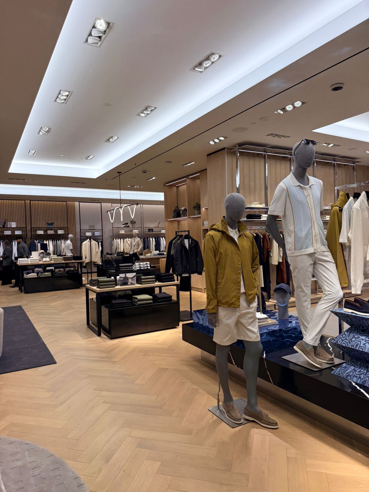 Mannequin platform with slat wall backdrop