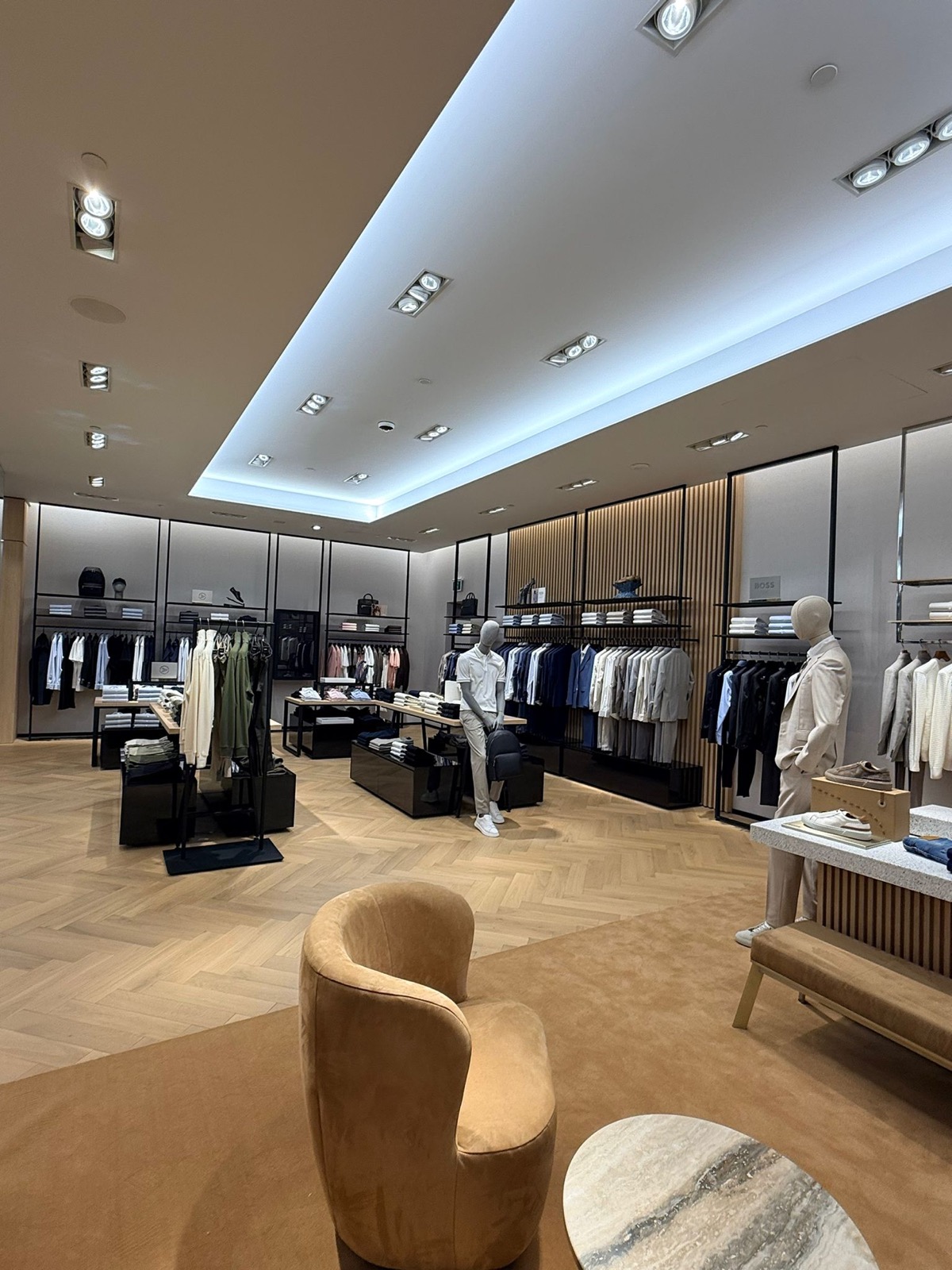 Lounge seating with apparel racks