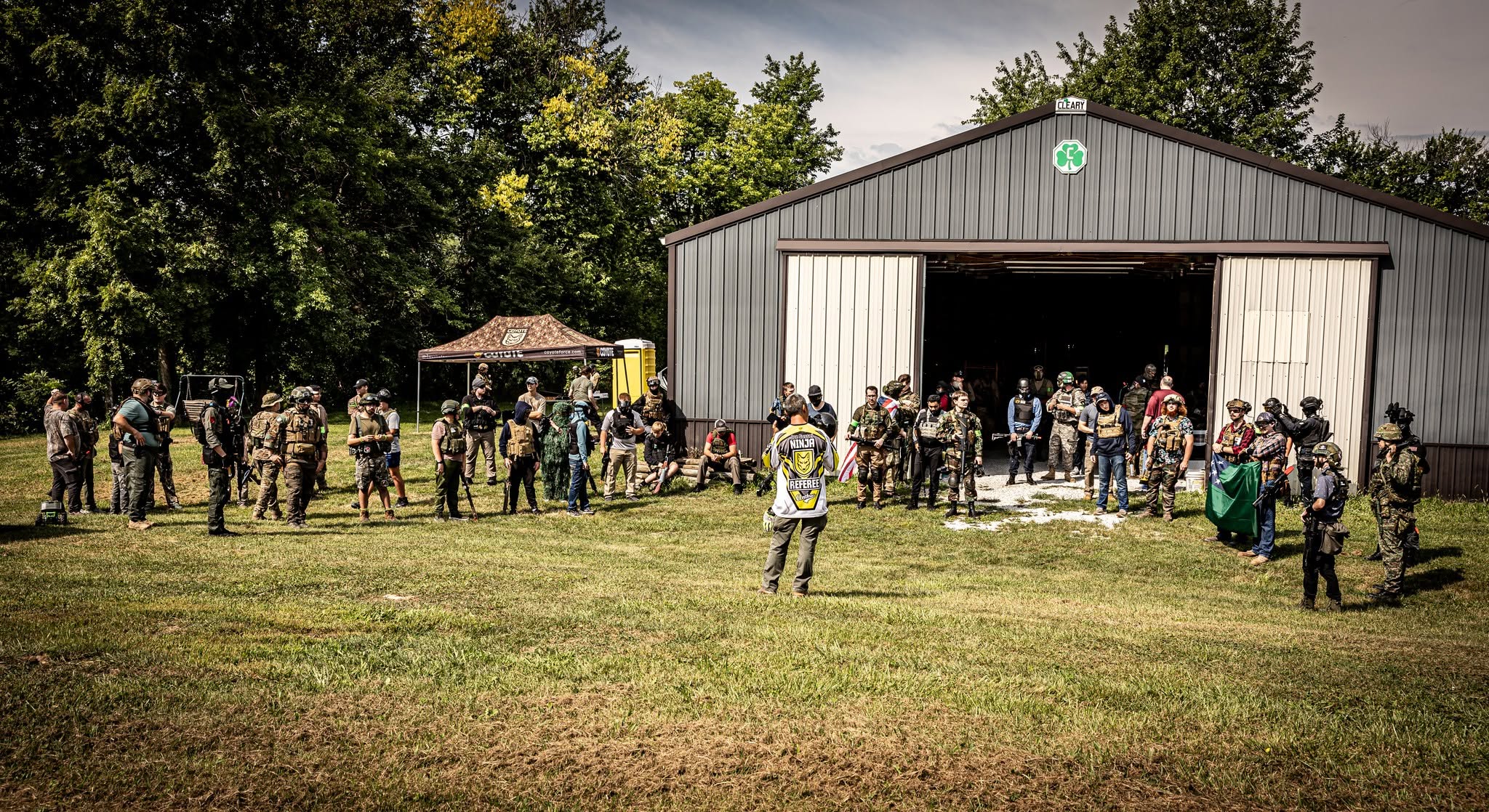 Coyote Force airsoft briefing outside the field barn in Ladoga, Indiana