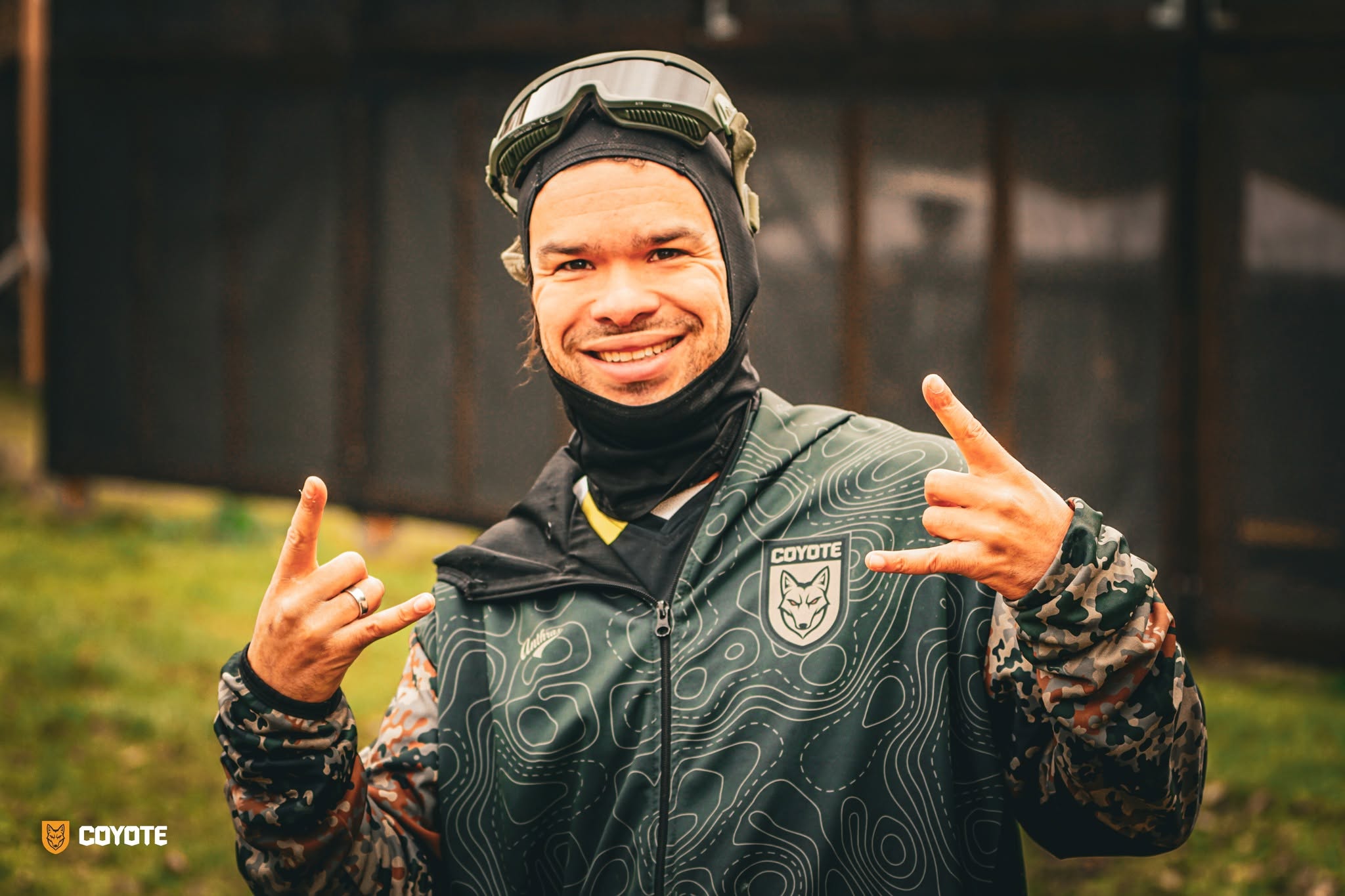 Coyote Force player in branded jersey making rock-on hand signs