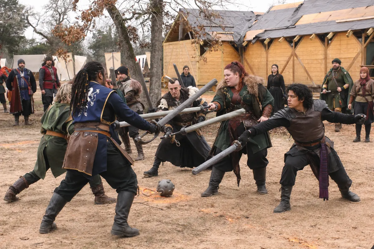Boffer melee with crossed polearms on the battlefield