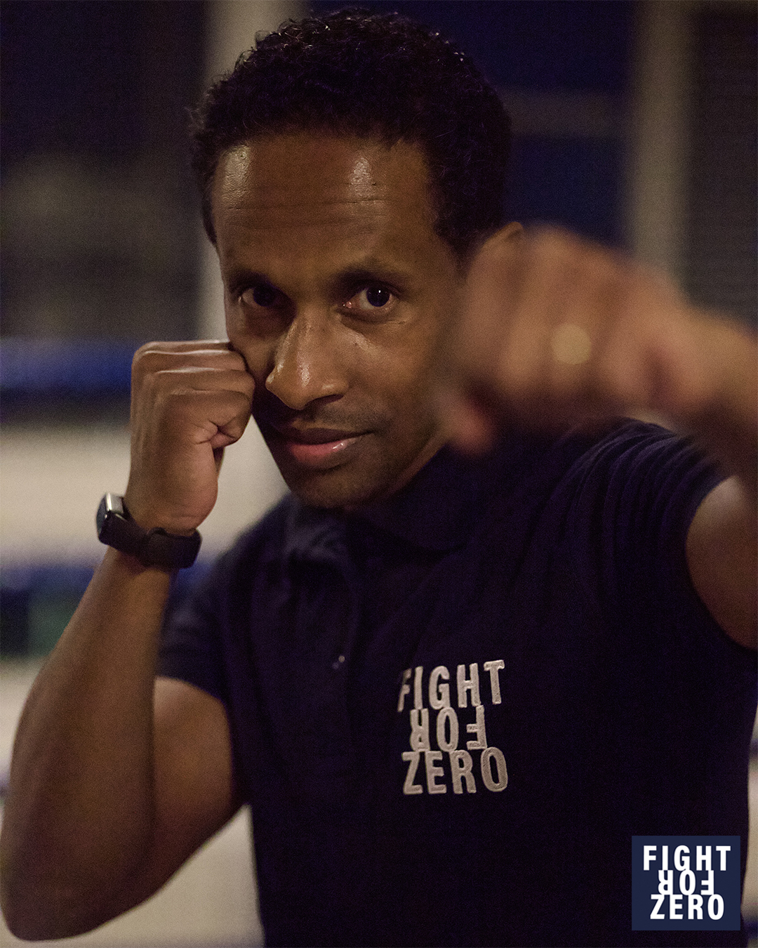 A photo of a boxer posing in front of camera 