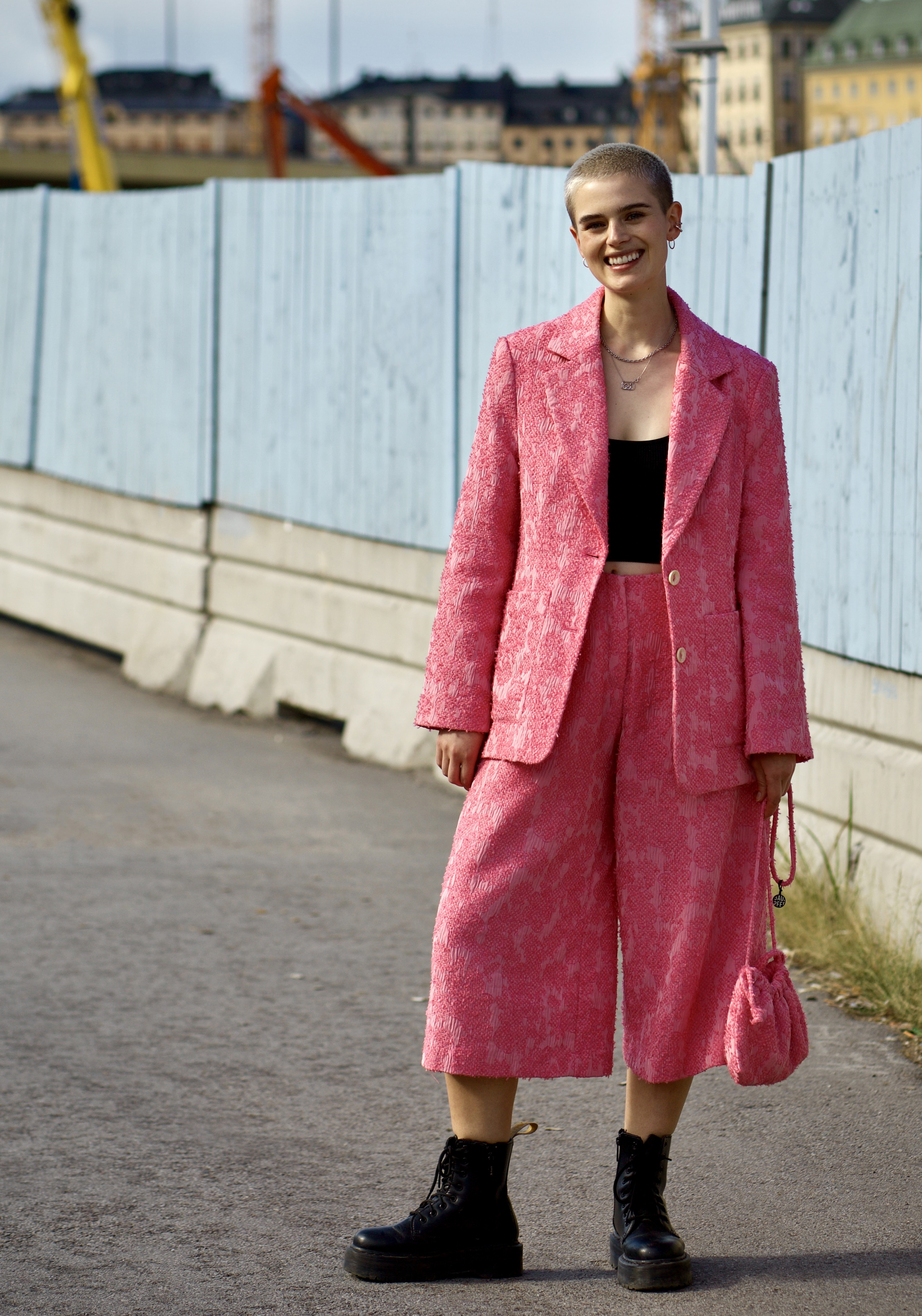 Model Cajsa Wessberg wears a pink suit matches with pink trousers