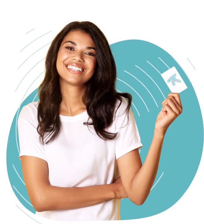 Smiling woman in white shirt holding a card with a fingerprint icon on a teal abstract background.