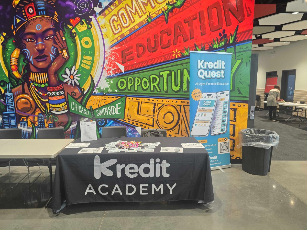The Kredit Academy table and Kredit Quest banner at the Chicago Urban League housing fair