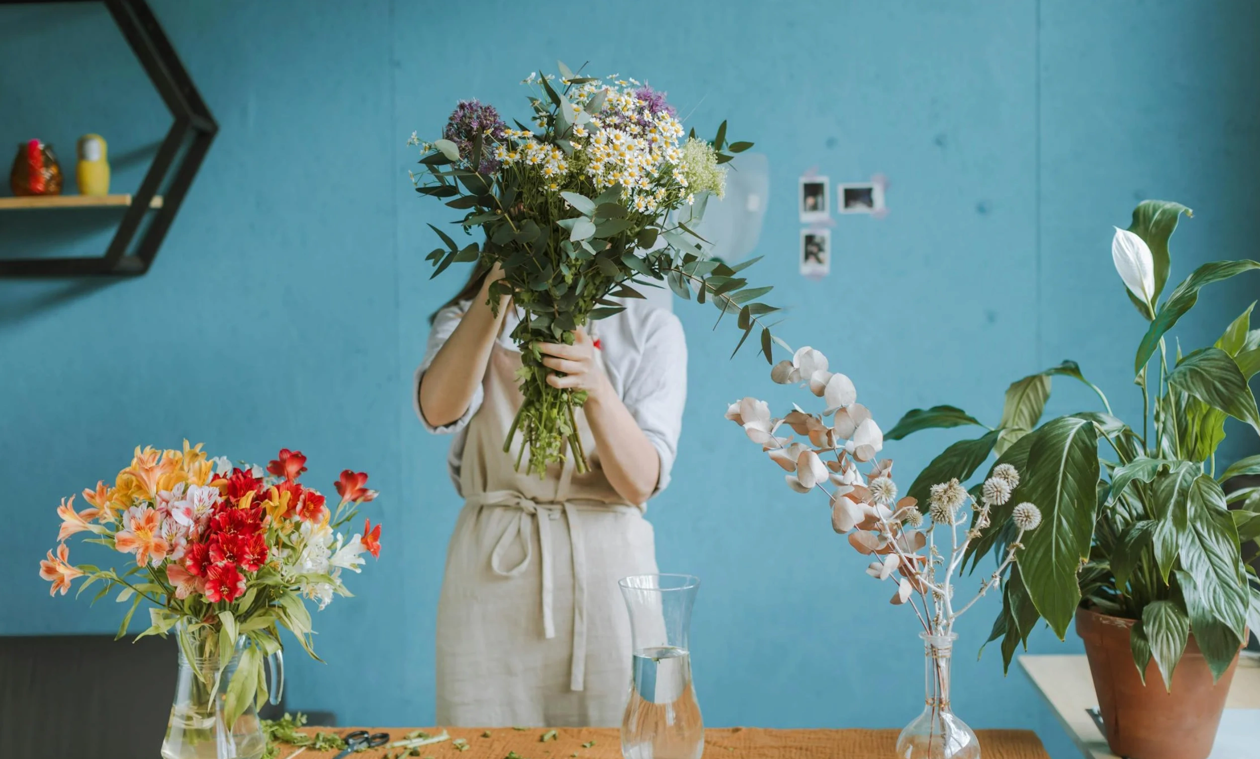 florist working on bouquet