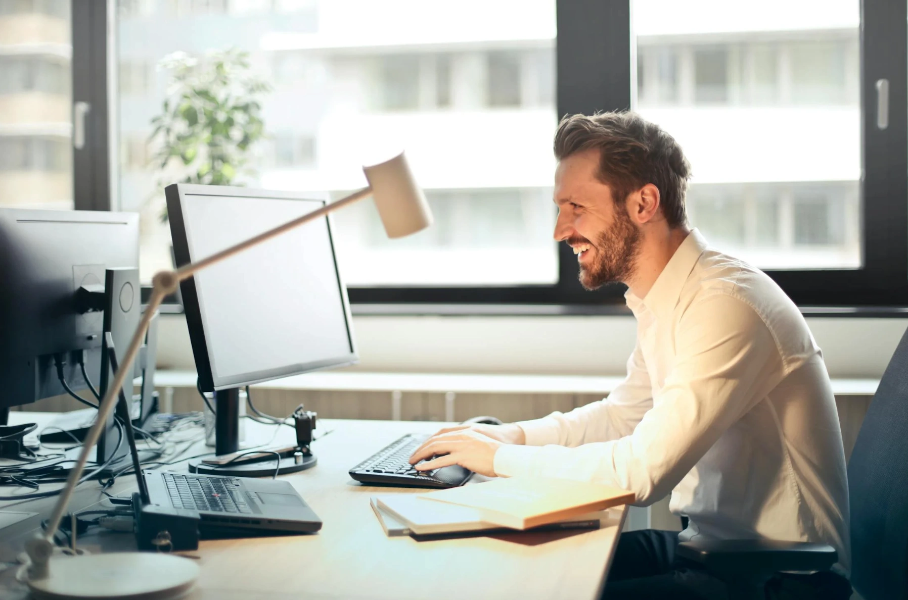 Man on computer in office