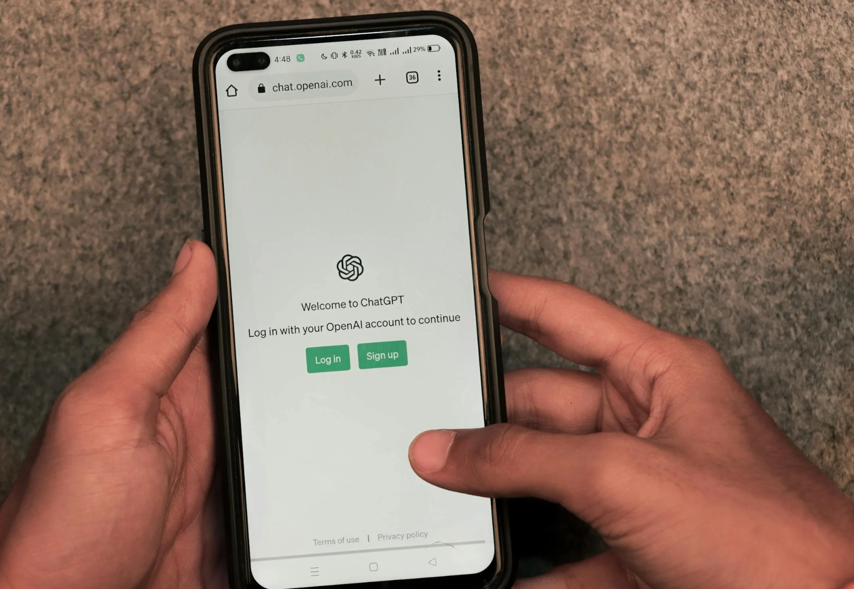 person using Chat GPT on iPhone