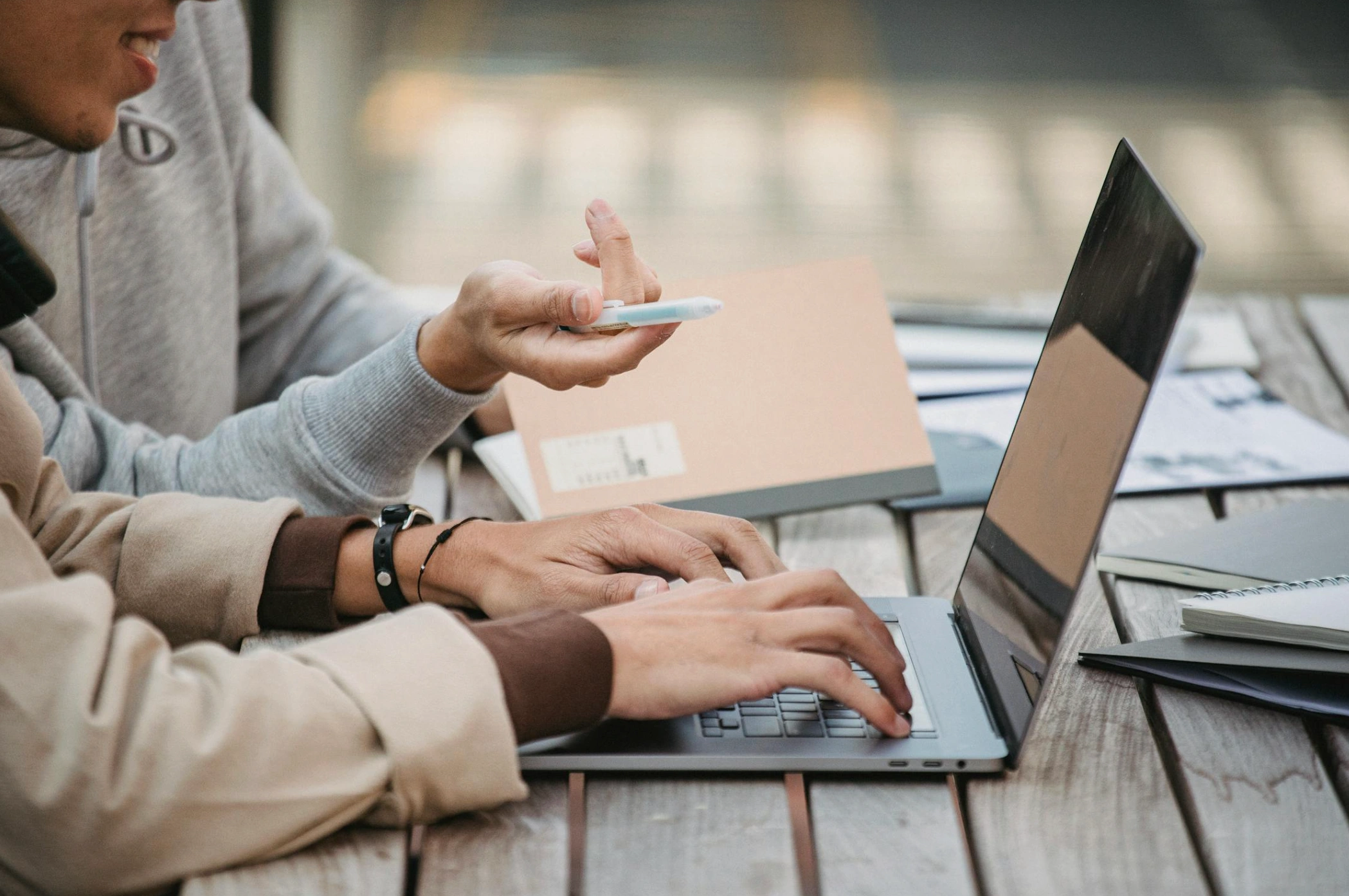 people working together on laptop