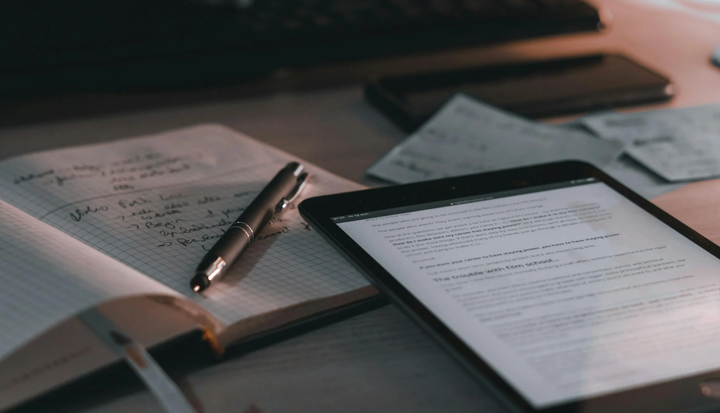 tablet next to notes