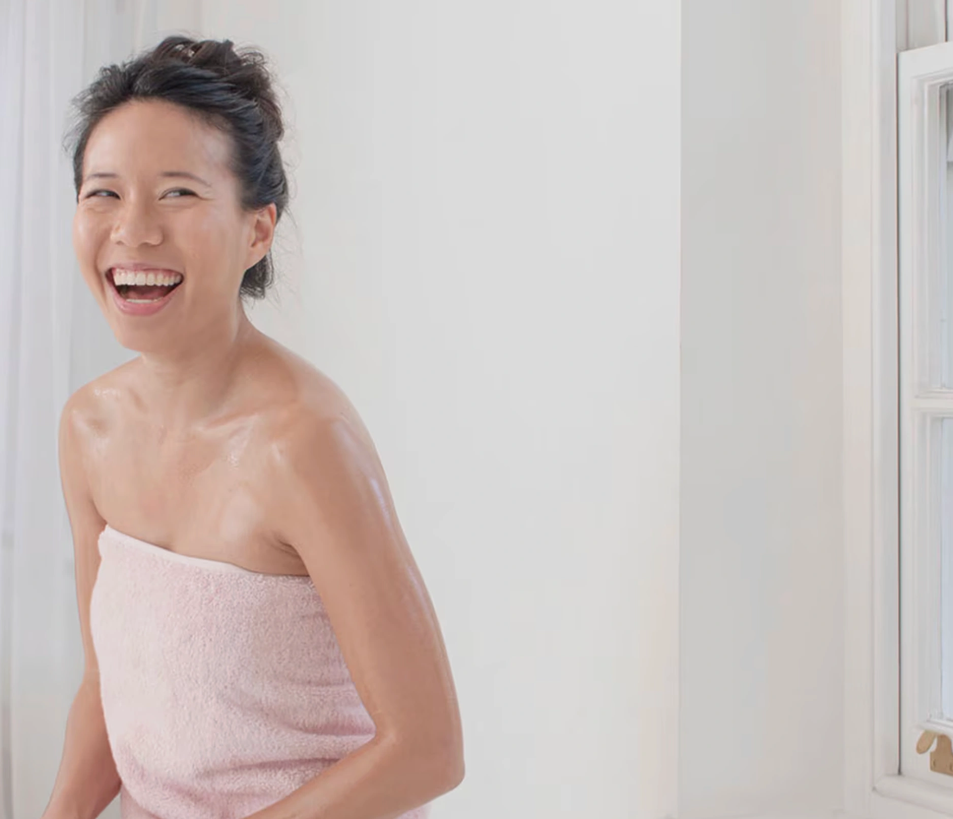 Dove imagery, woman wrapped with bath towel