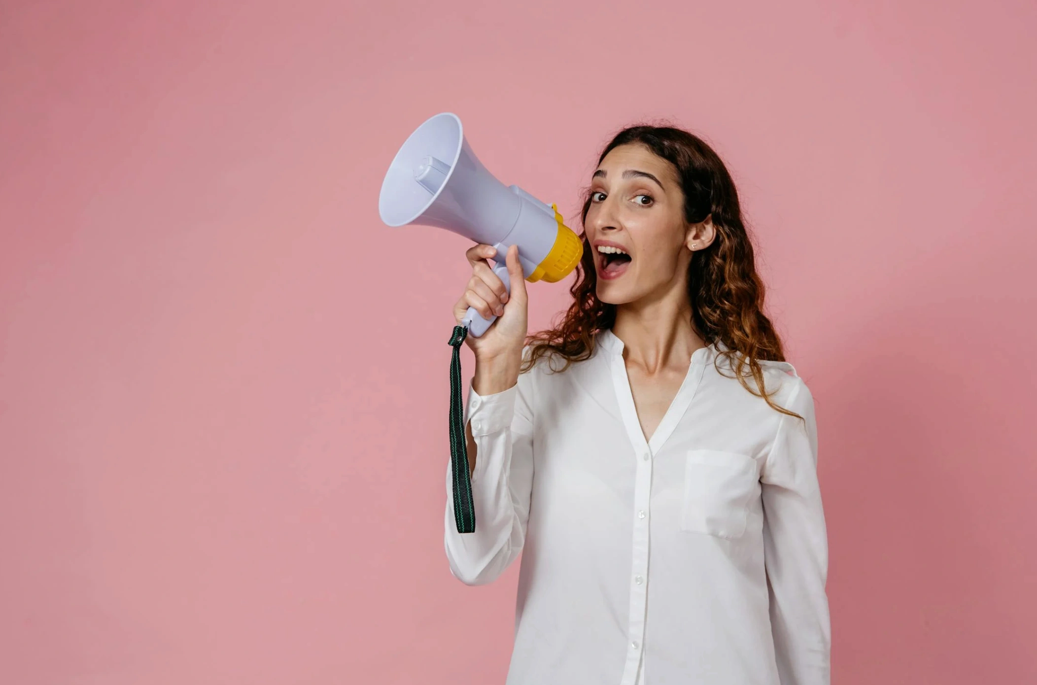 women announcing on the microphone