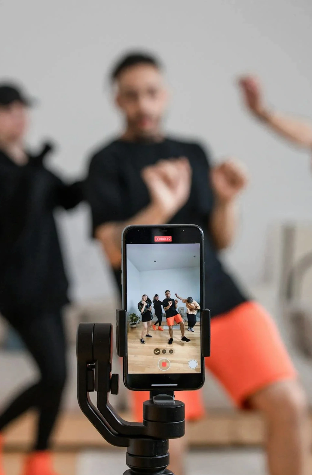 people recording dance video