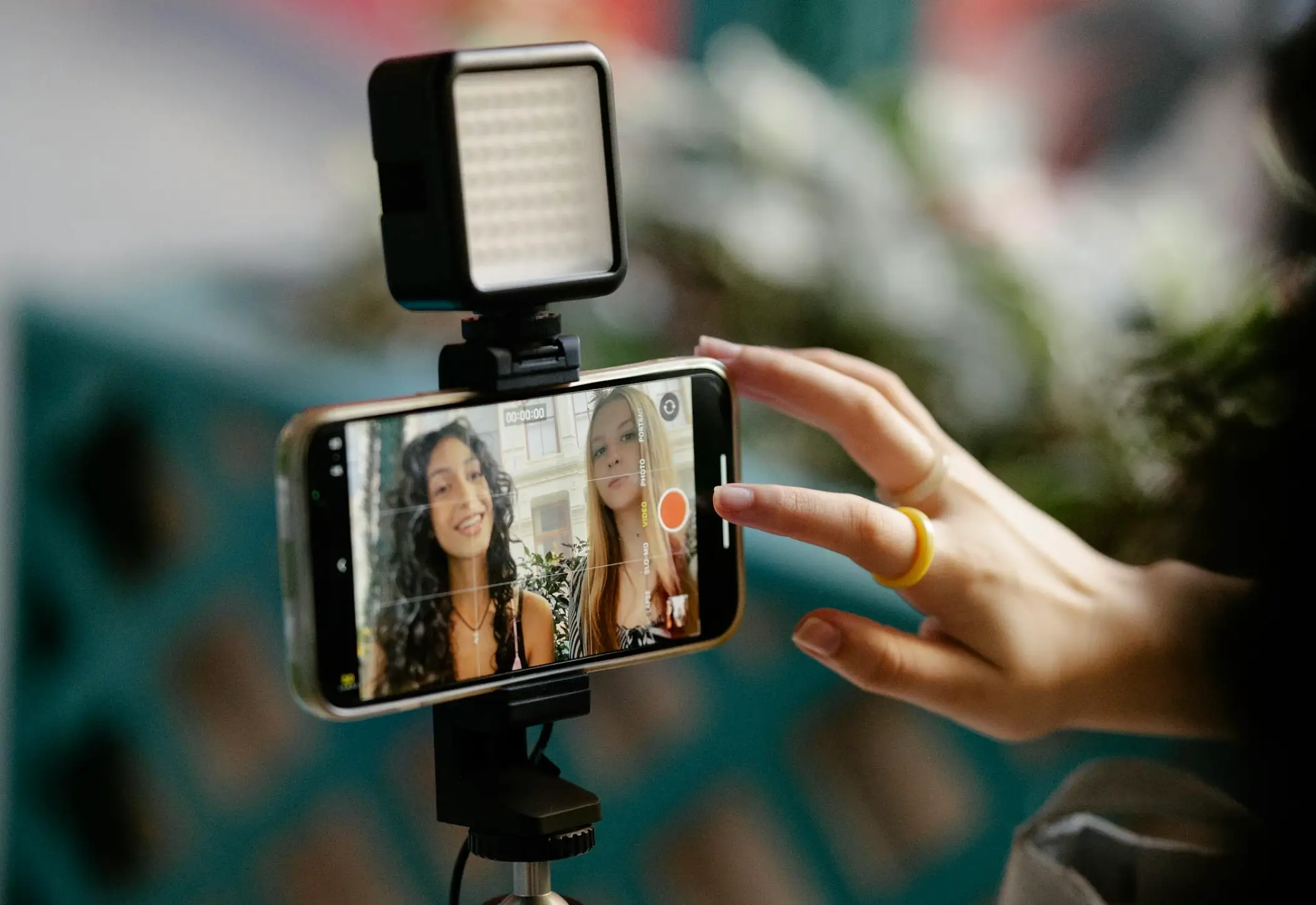 girls recording video content on mobile