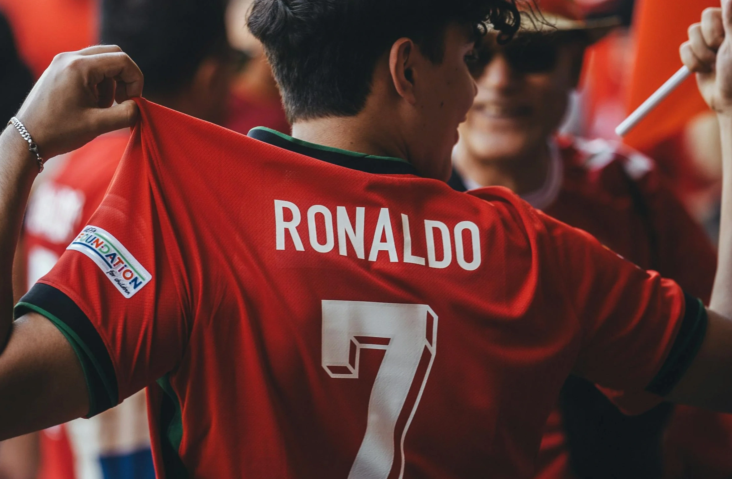 boy wearing Ronaldo #7 jersey