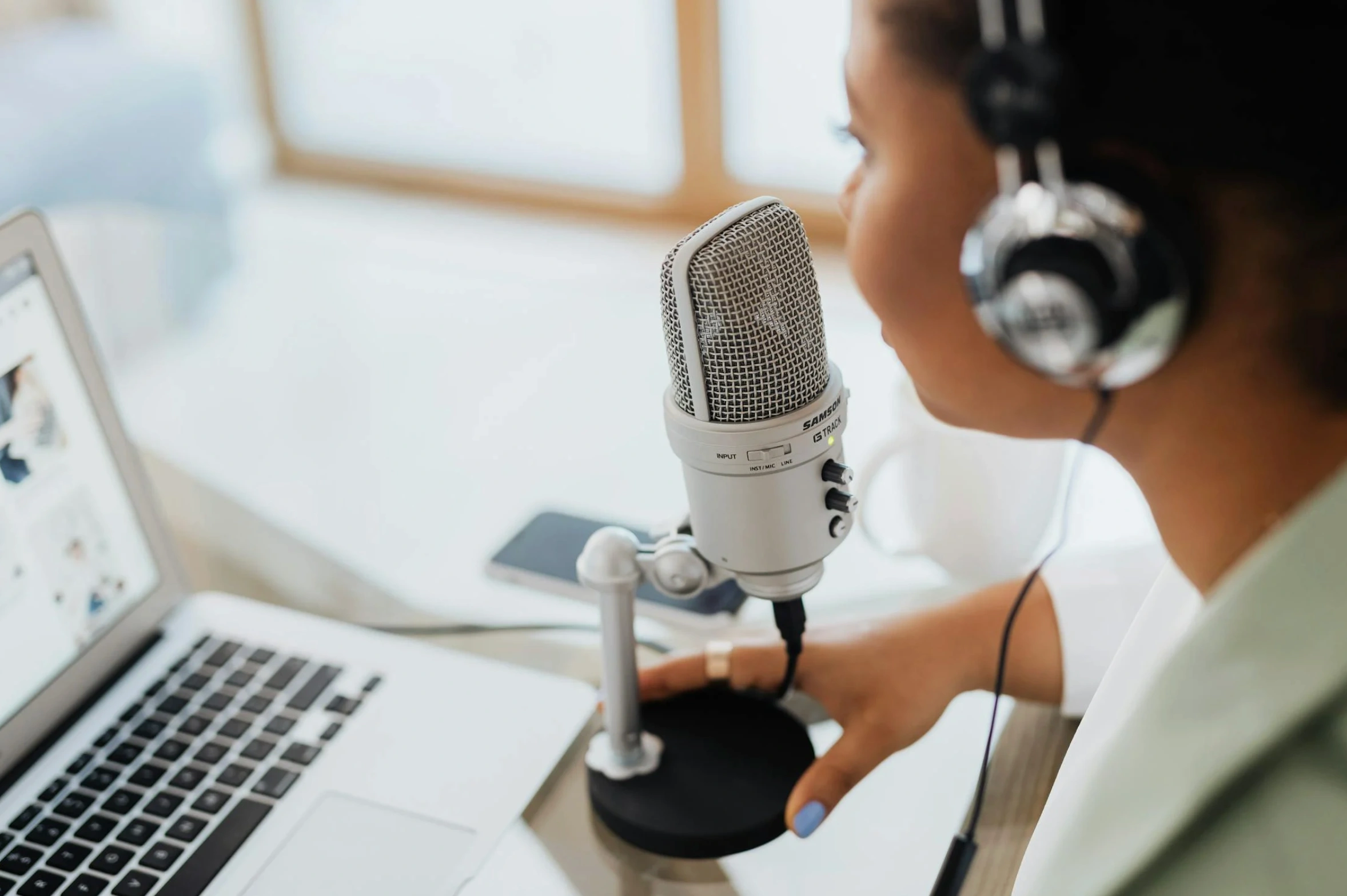 woman recording a podcast