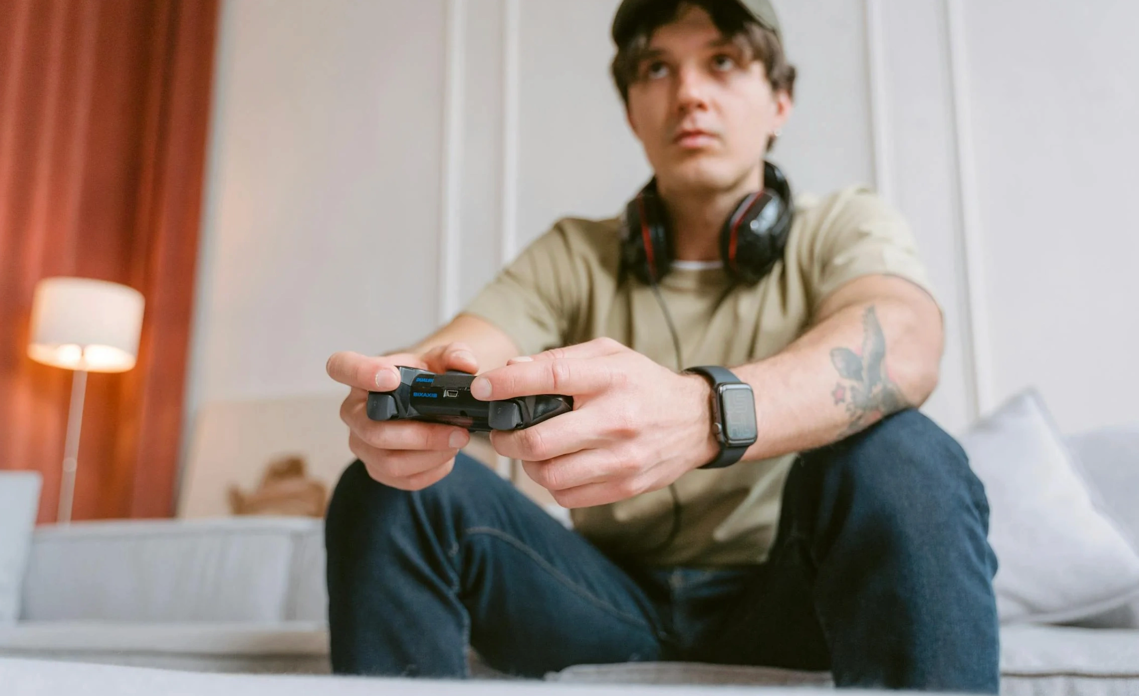 man using gaming controller