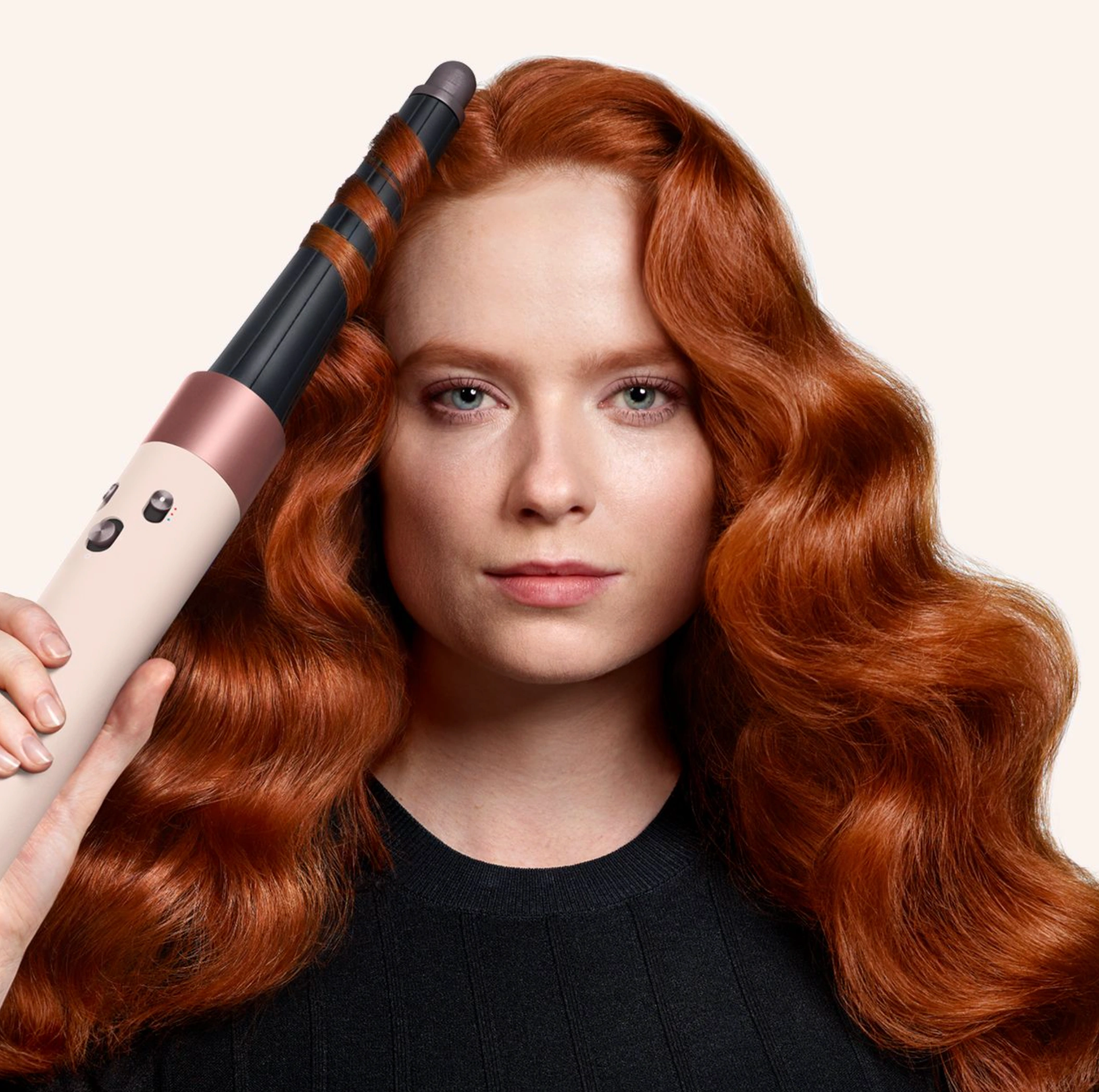 woman using Dyson airwrap