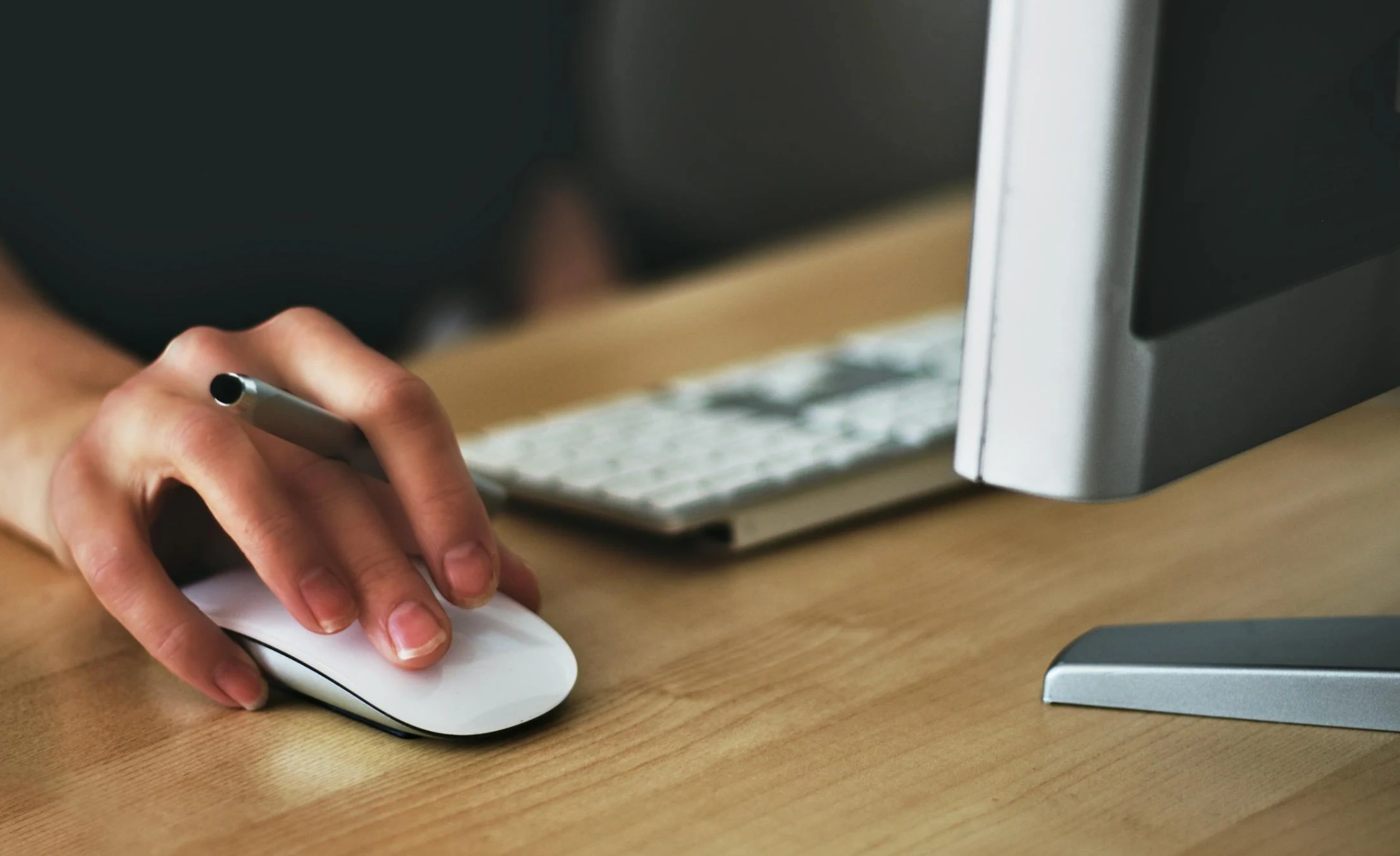 person clicking computer mouse