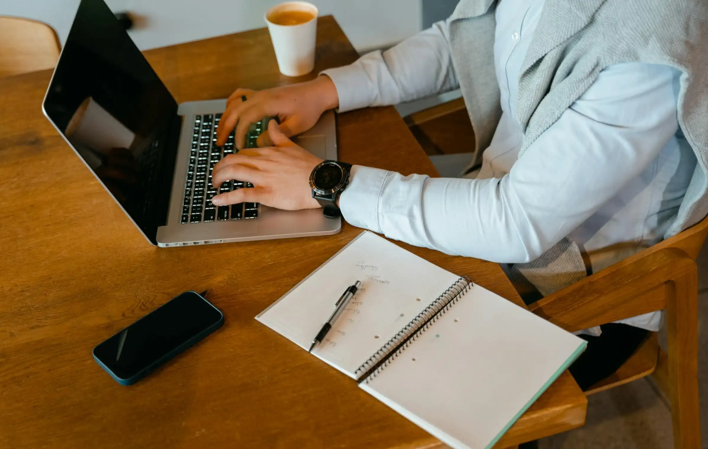 person doing work on laptop