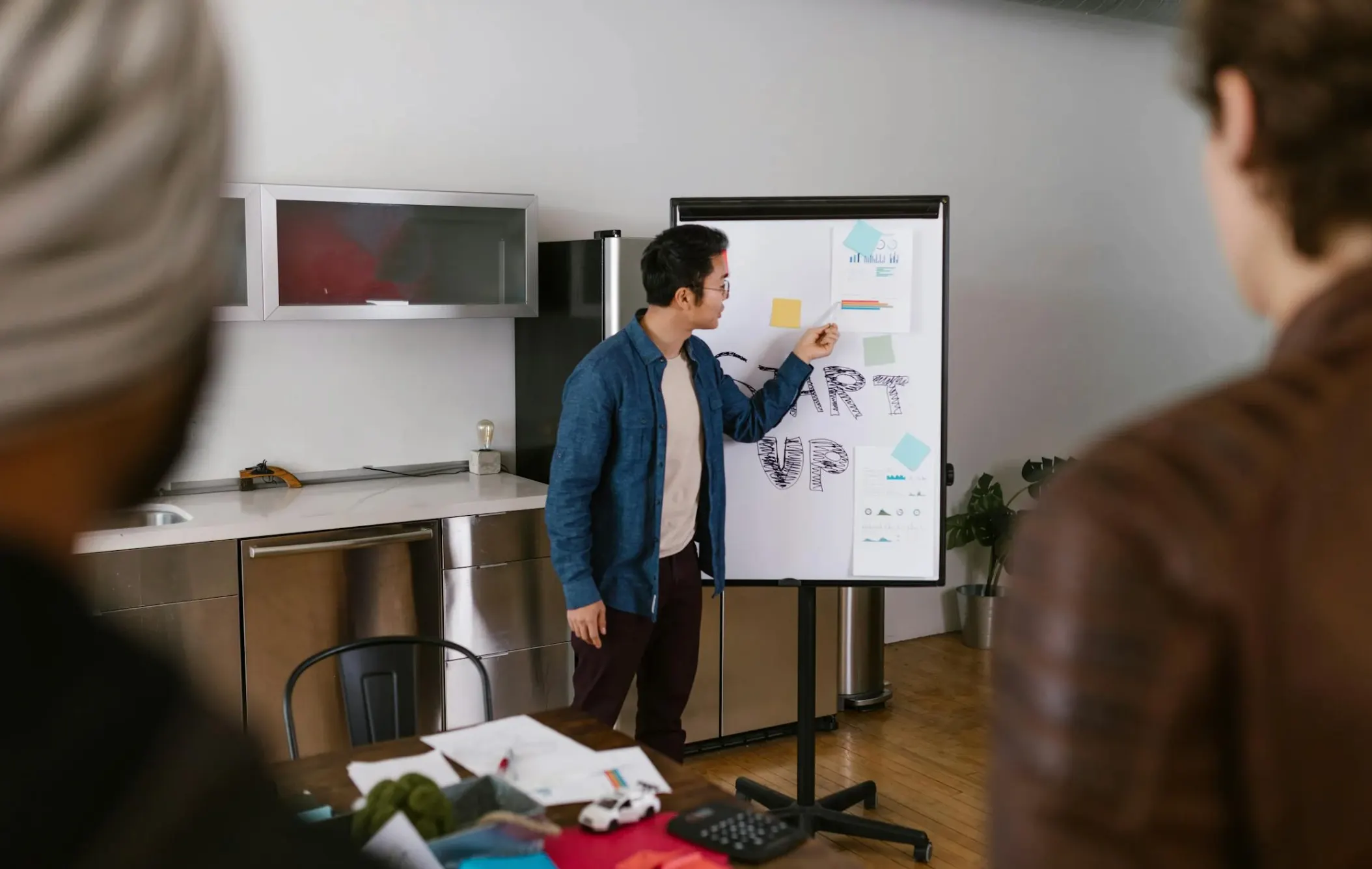 person presenting on white board