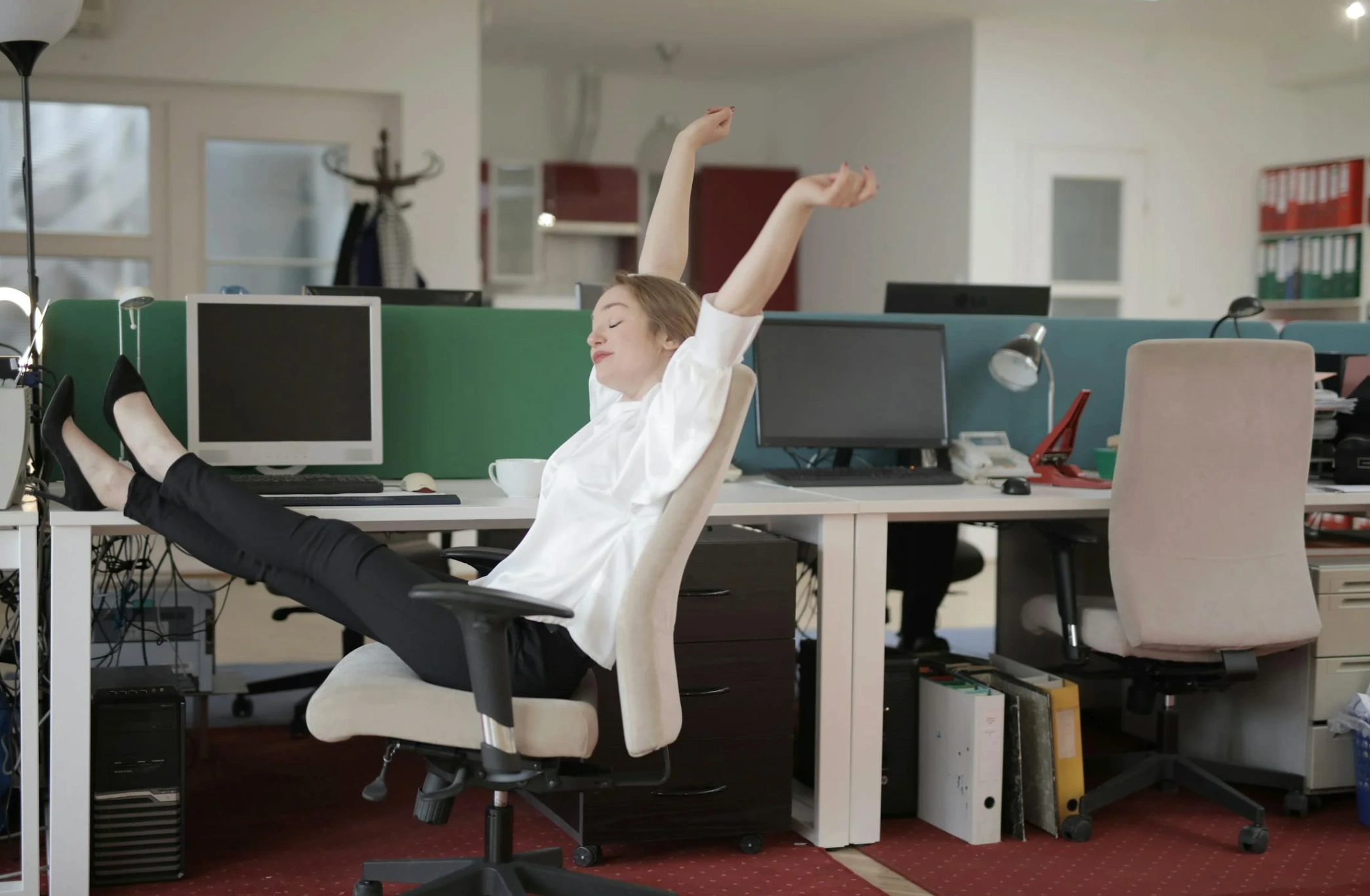 woman seeming satisfied with work