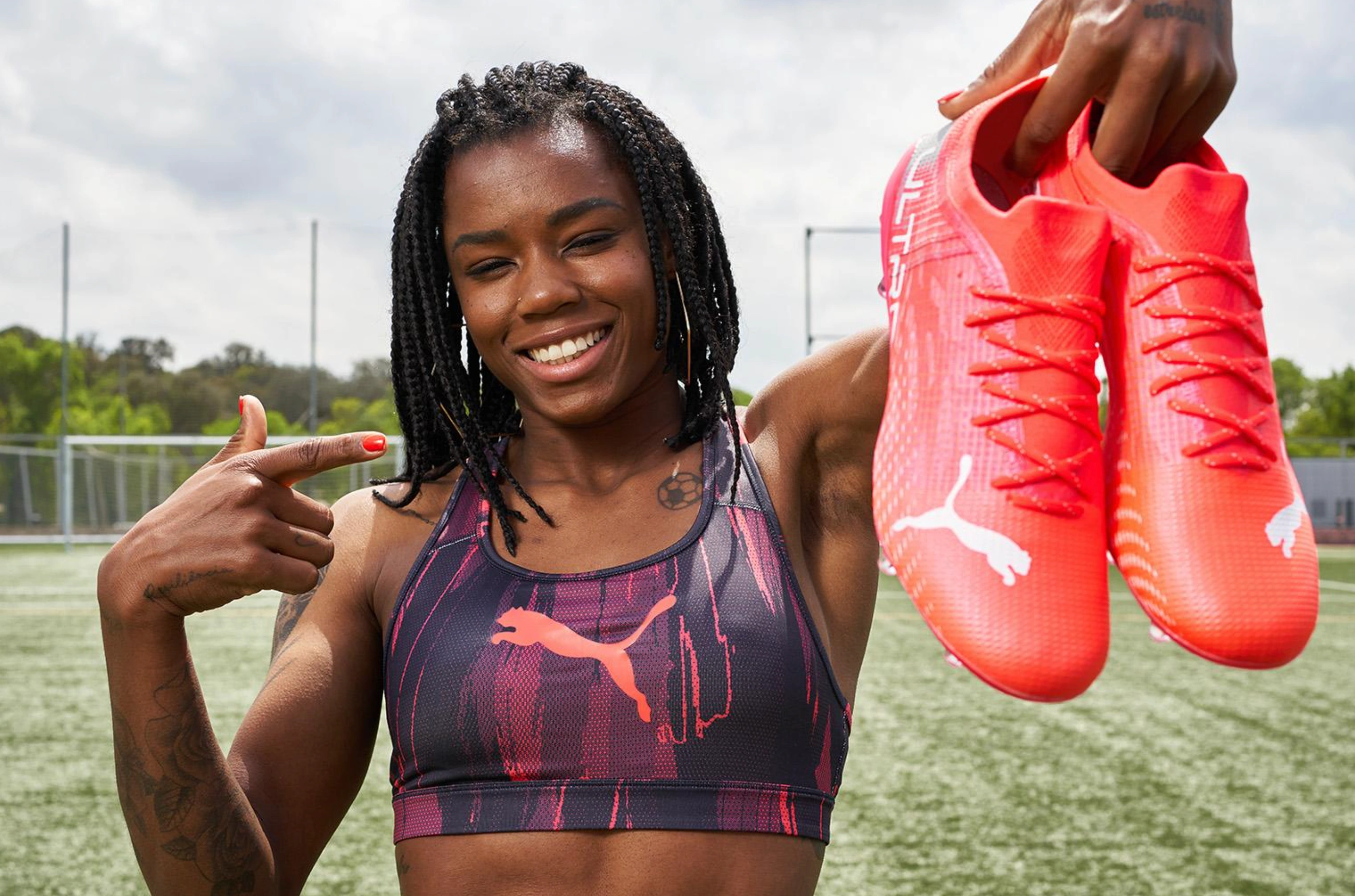 woman carring Puma shoes