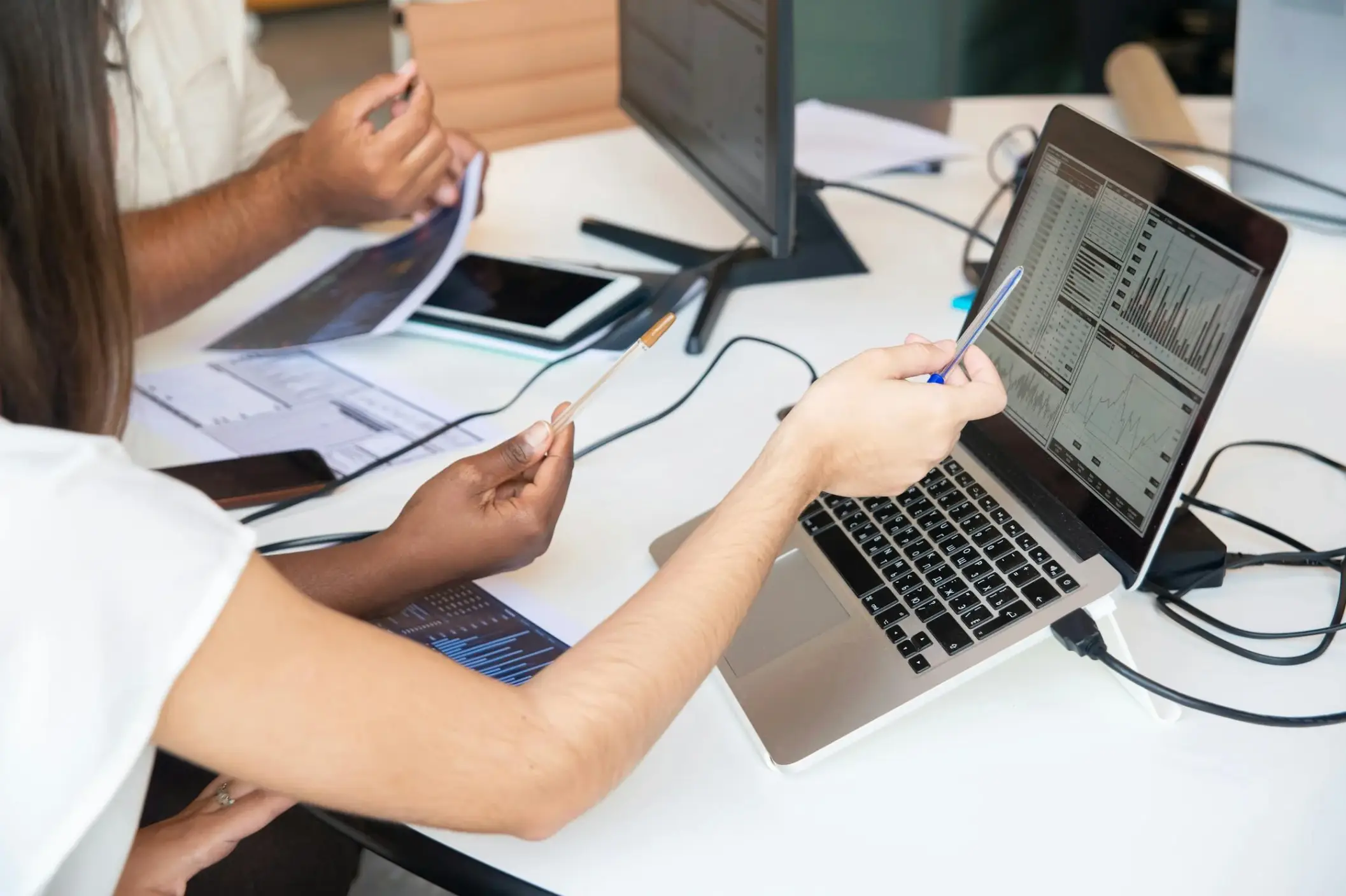 People analyzing graphs