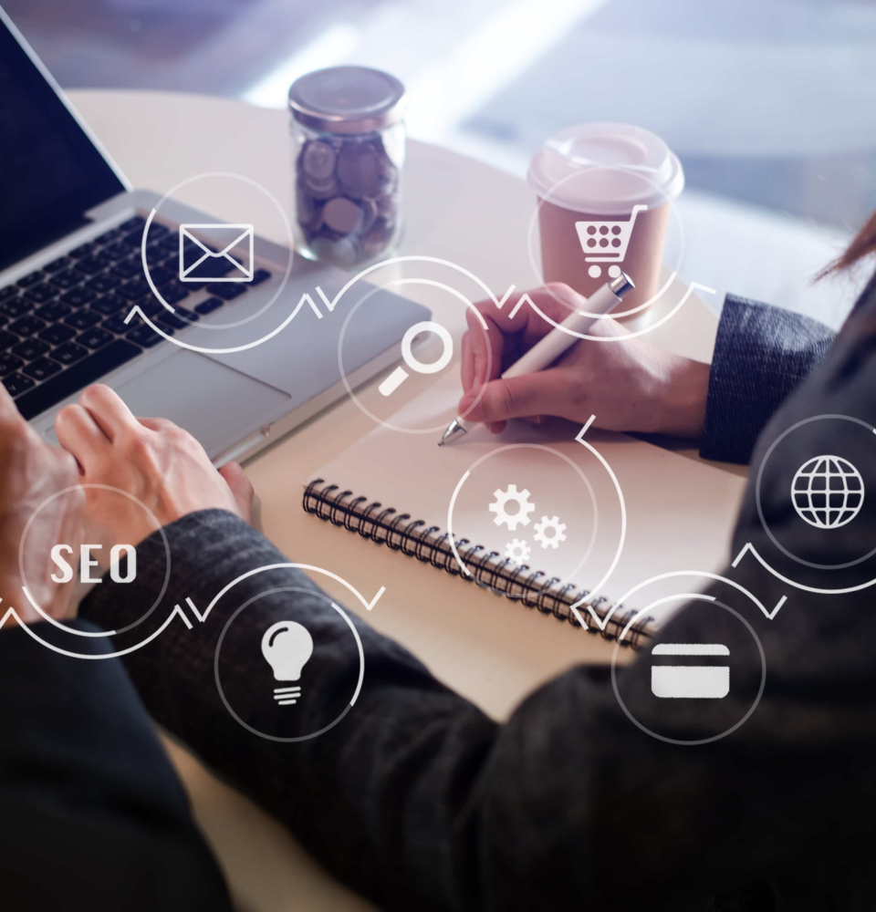 Person holding a digital dashboard showing SEO services Canada analytics, rankings, and optimization metrics.