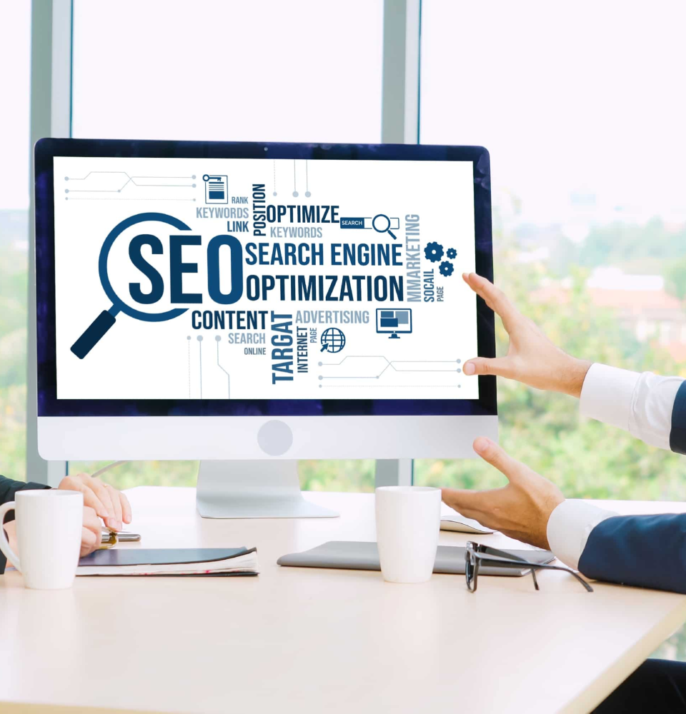 Person holding a digital dashboard showing SEO services Canada analytics, rankings, and optimization metrics.