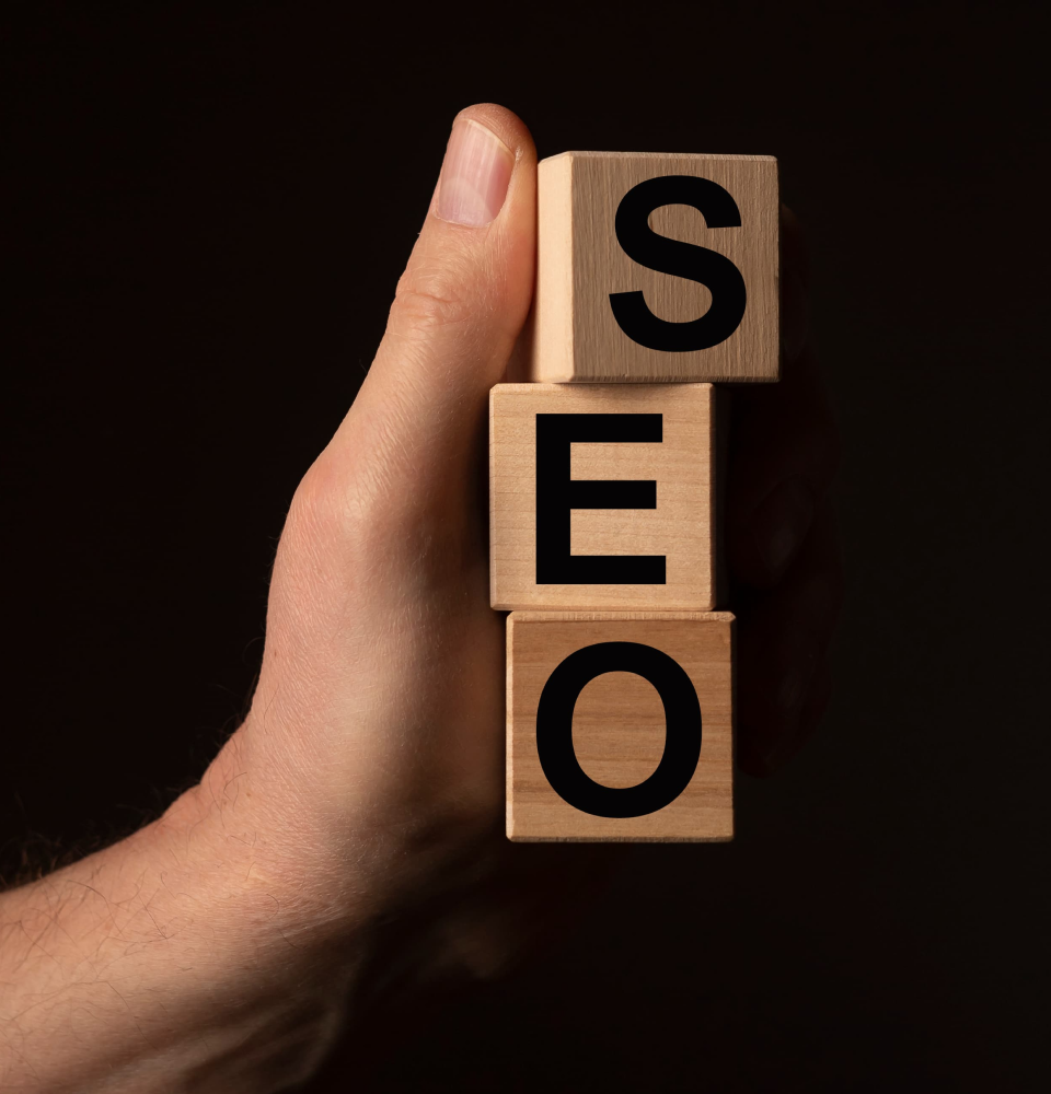 Person holding a tablet showing SEO services Canada process with content, web analysis, traffic, and ranking icons.