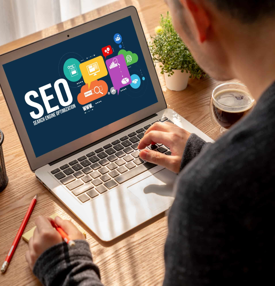Person holding a digital dashboard showing SEO services Canada analytics, rankings, and optimization metrics.