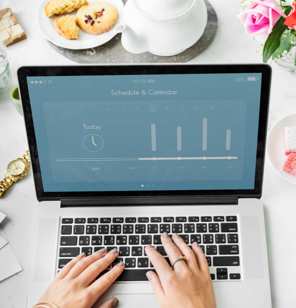 Person holding a digital dashboard showing SEO services Canada analytics, rankings, and optimization metrics.