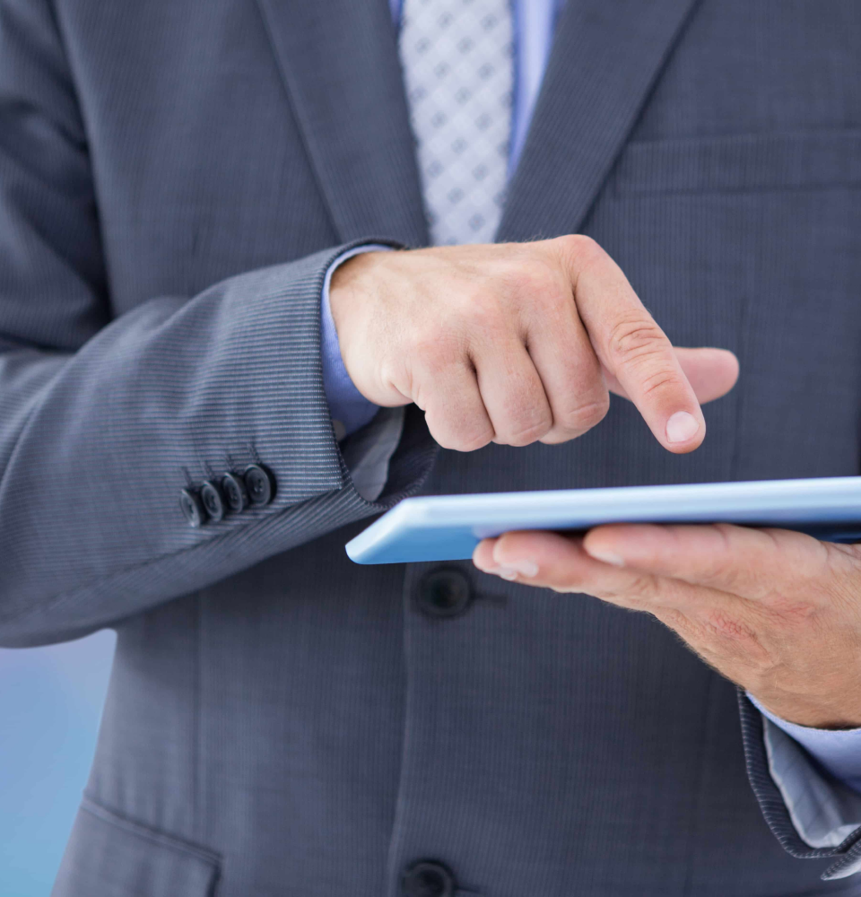 Person holding a tablet showing SEO services Canada process with content, web analysis, traffic, and ranking icons.