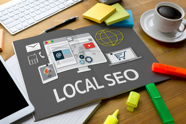 Local SEO strategy with website, digital marketing and e-commerce icons on clipboard at office workspace.