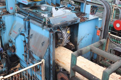 Timber logs getting stripped back