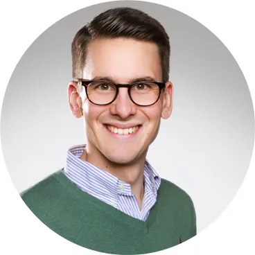 Foto von Dr. Moritz Liebeknecht.  Lächelt in die Kamera.