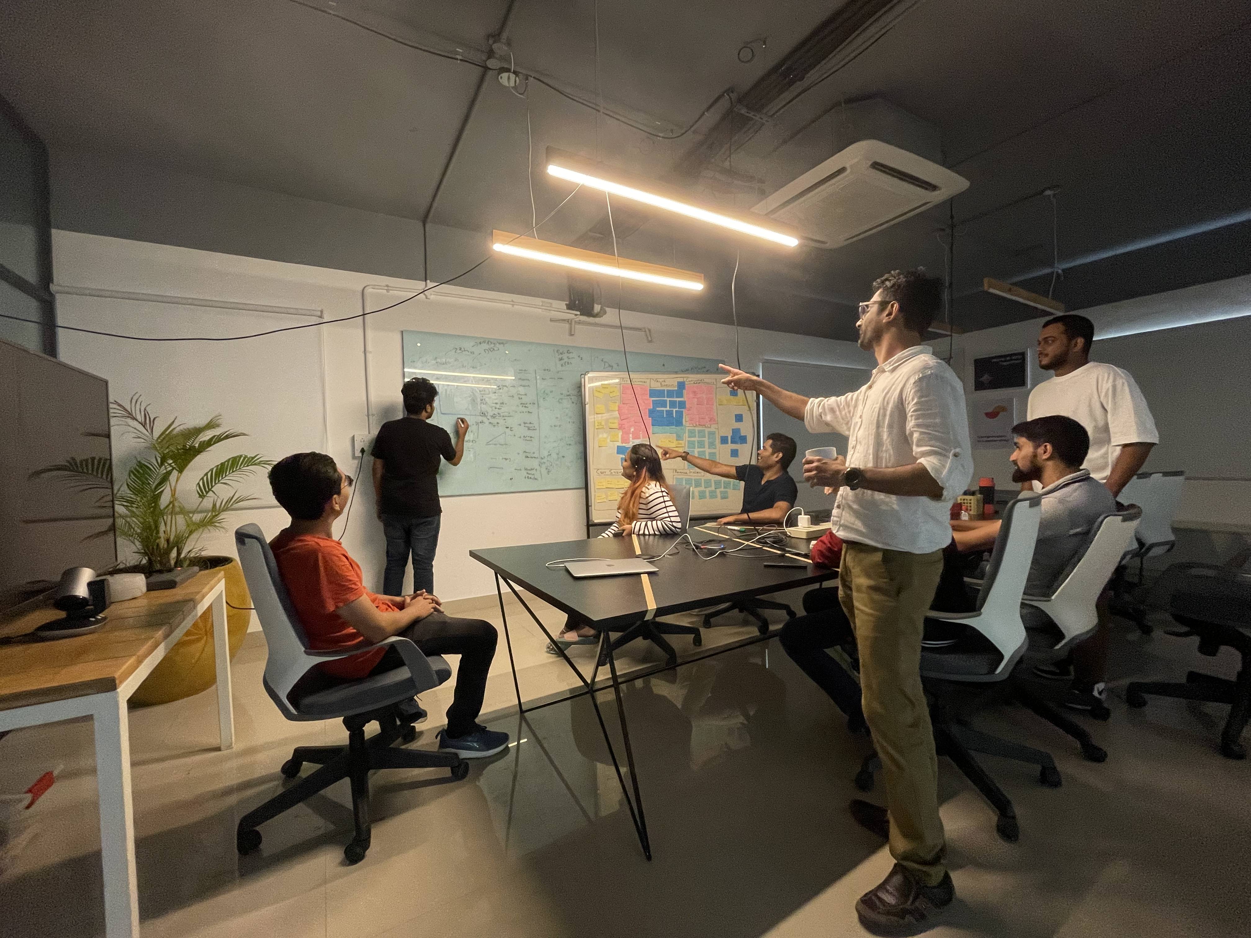 Folks working on office together on a particular project.