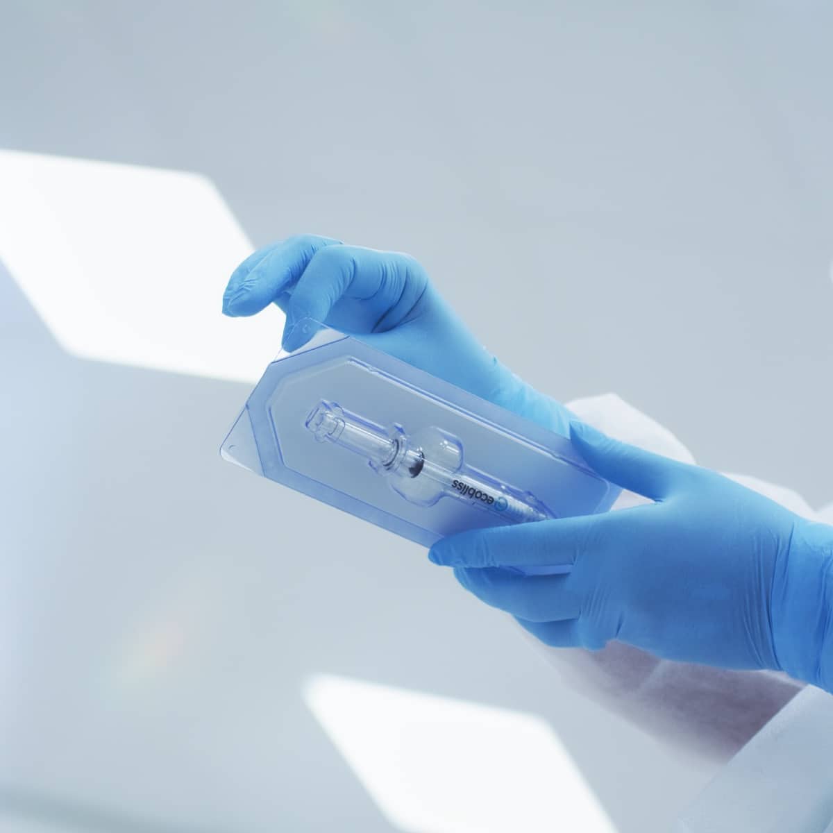 Hands opening medical device packaging