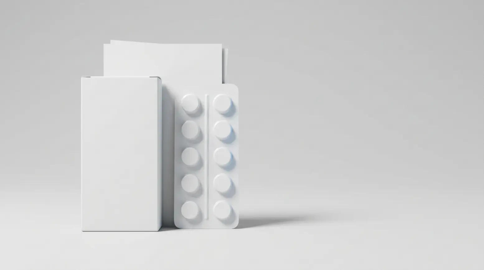 Clean white pharmaceutical packaging mockup on a light grey background, minimal and elegant.