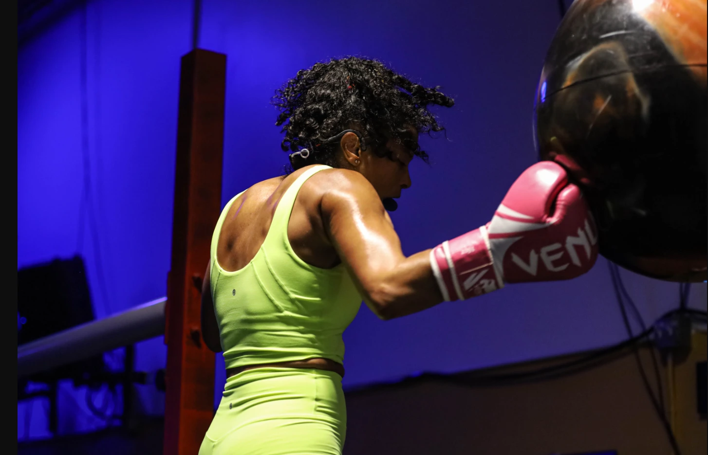 Paige sits on the floor during a short interval.