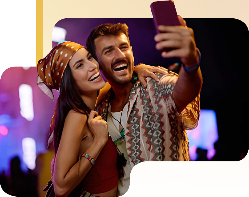 Music fans taking a selfie at a concert