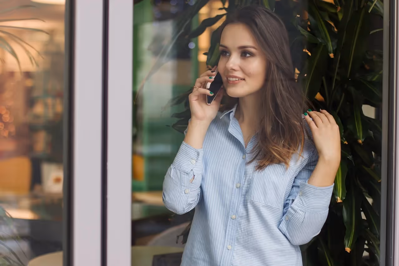 Smiling woman on phone