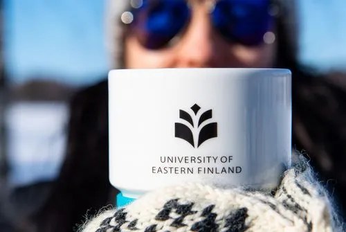 Coffee mug with university logo